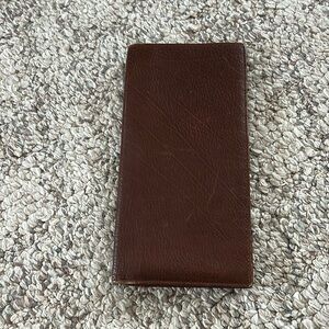 Brown coach breast wallet